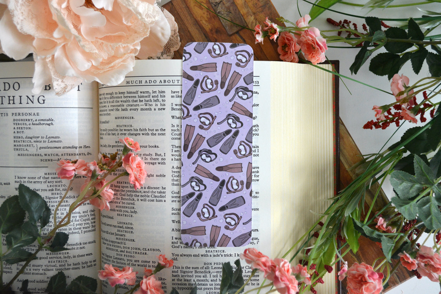 Purple bookmark with illustrations of snorkel gear.
