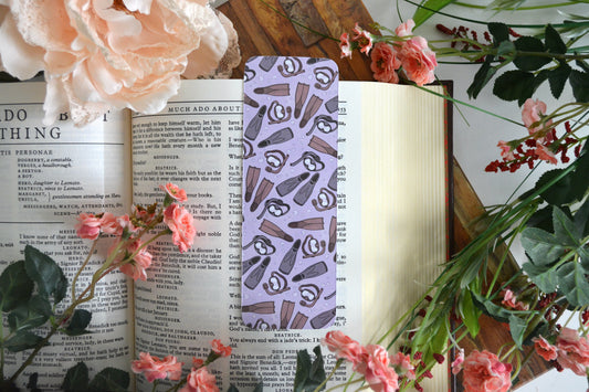 Purple bookmark with illustrations of snorkel gear.