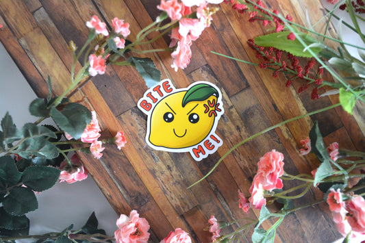Individual sticker of a cute and sassy lemon with text reading "Bite me!"