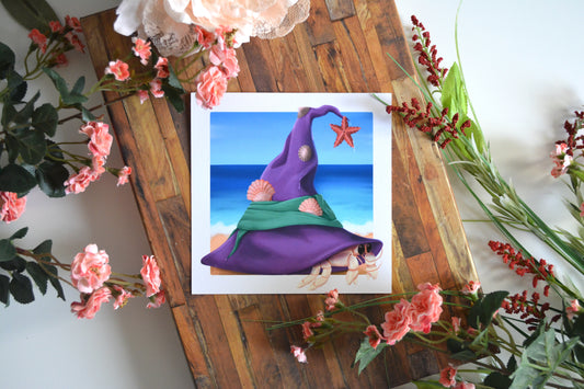 Art print illustration of a hermit crab wearing a purple witch's hat as its unique new home.