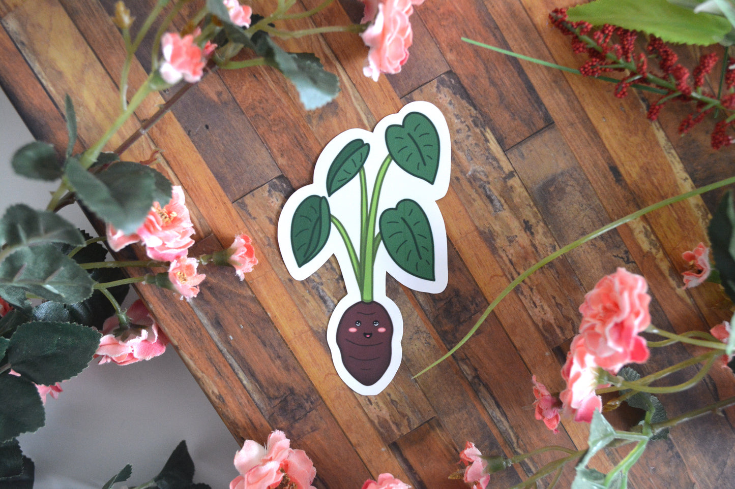 Individual sticker of a kalo (taro) illustration with a cute kawaii facial expression.