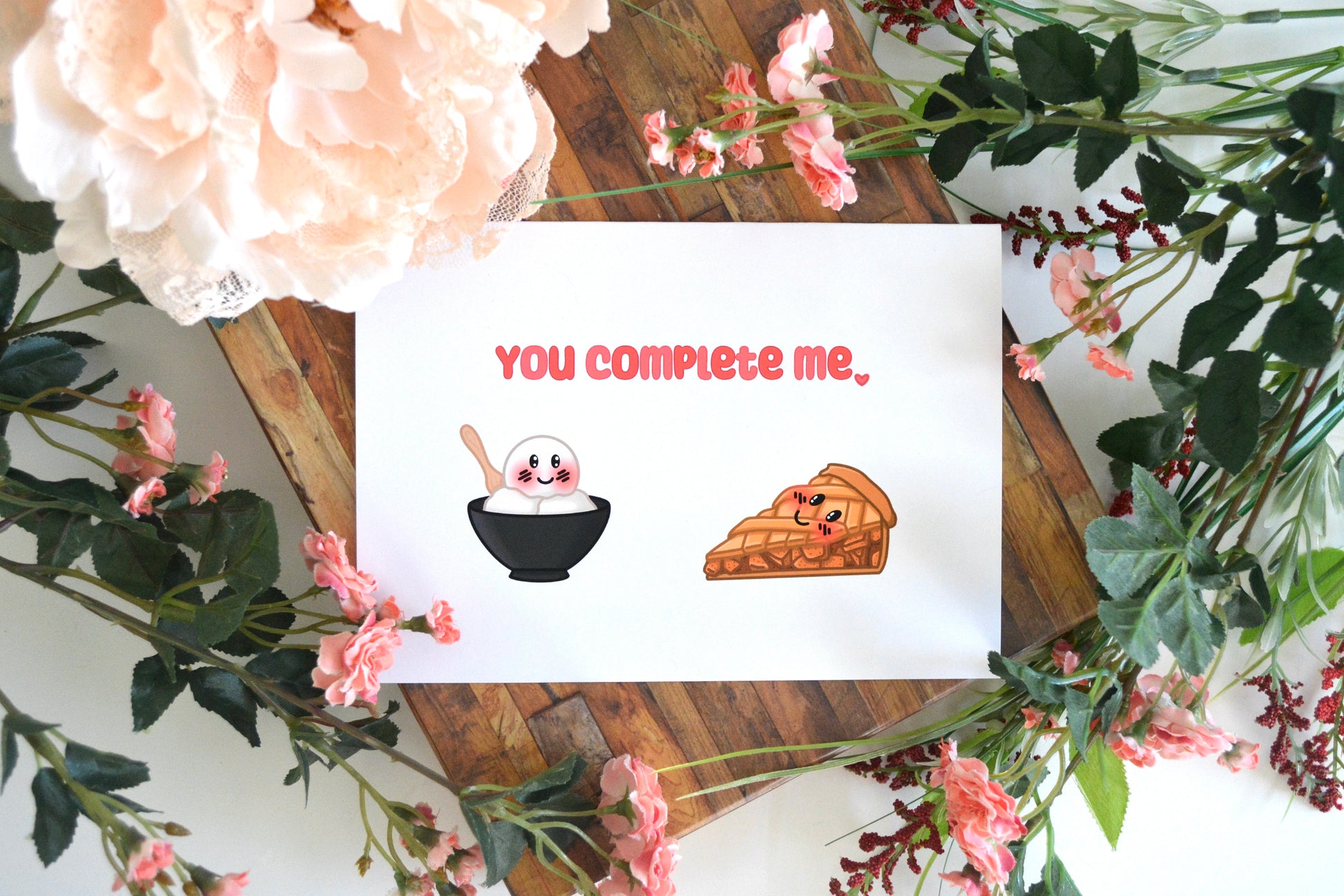 Greeting card with "You Complete Me" text and ice cream and pie images on front.